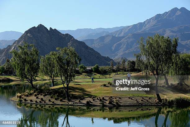 Rickie Fowler hits a tee shot on the 14th hole on the Jack Nicklaus Private Course at PGA West during the second round of the Humana Challenge in...