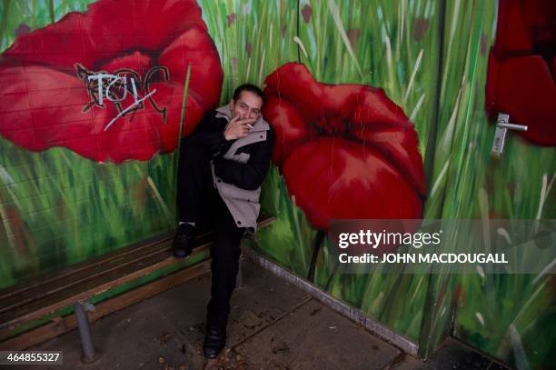 Bosnian Roma actor Nazif Mujic, who won a Silver Bear for best actor at the Berlinale Film Festival in February 2013, poses in a waiting area outside...