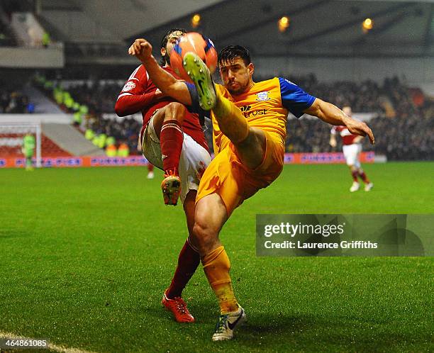 David Buchanan of Preston North End clears the ball from Djamel Abdoun of Nottingham Forest during the FA Cup with Budweiser Fourth round match...