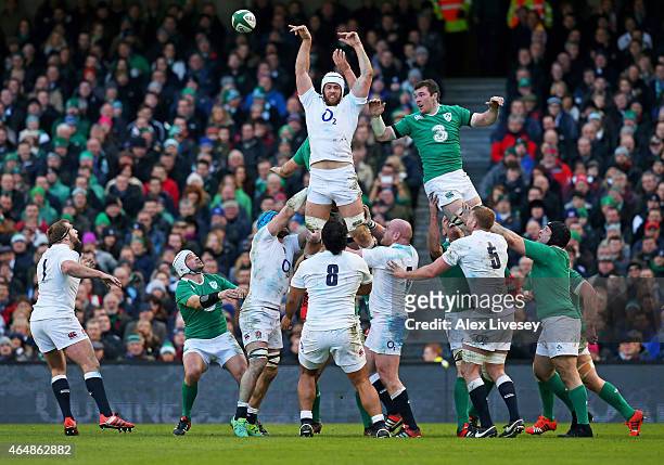 Dave Attwood of England wins lineout ball under presure from Peter O'Mahoney of Ireland during the RBS Six Nations match between Ireland and England...