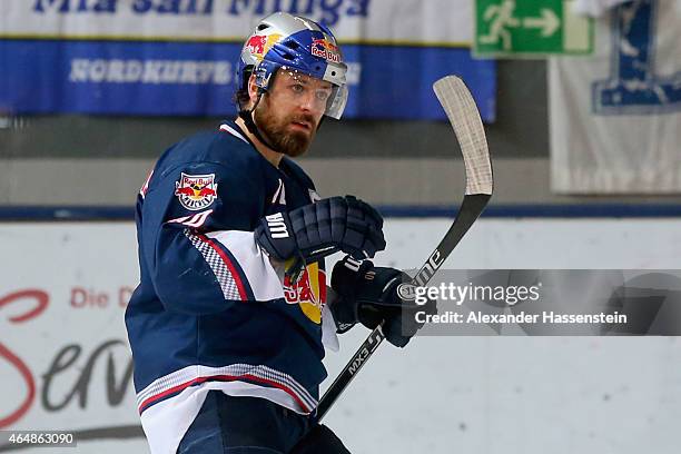 Daniel Sparre of Muenchen celebrates scoring the 2nd team goal during the DEL Ice Hockey match between EHC Red Bull Muenchen and Koelner Haie at...