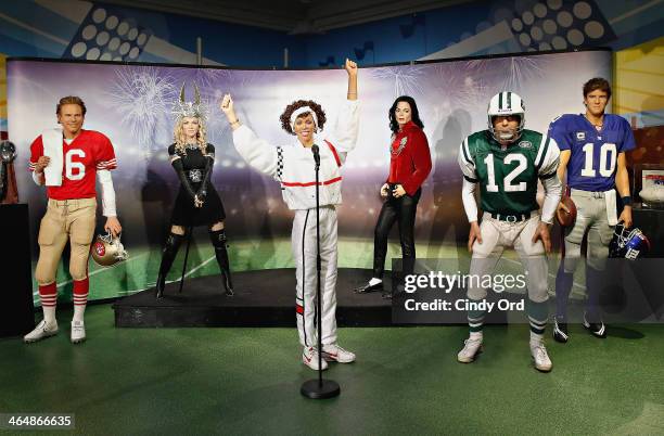 Madame Tussauds wax figures of professional football player Joe Montana, singer Madonna, singer Whitney Houston, singer Michael Jackson, professional...