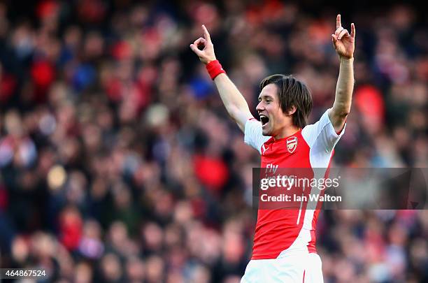 Tomas Rosicky of Arsenal celebrates as he scores their second goal during the Barclays Premier League match between Arsenal and Everton at Emirates...