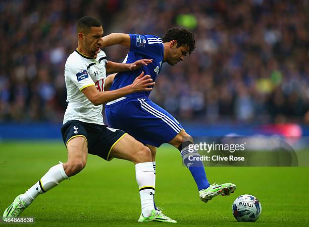 Diego Costa of Chelsea holds off Nabil Bentaleb of Spurs uring the Capital One Cup Final match between Chelsea and Tottenham Hotspur at Wembley...