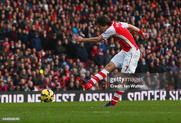 Tomas Rosicky of Arsenal scores their second goal during the Barclays Premier League match between Arsenal and Everton at Emirates Stadium on March...