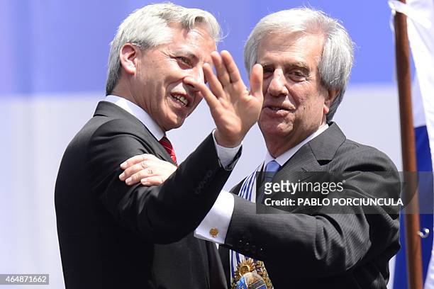 Uruguay's new President Tabare Vazquez is greeted by Bolivian Vice President Alvaro Garcia Linera, during his inauguration ceremony at Independencia...