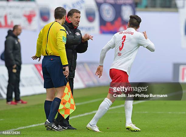 Coach Achim Beierlorzer of RB Leipzig gives instructions to Anthony Jung of RB Leipzig during the game between RB Leipzig and 1 FC Union Berlin on...