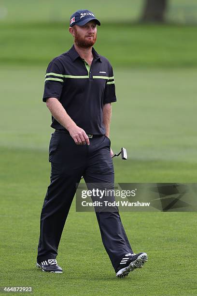 Bronson La'Cassie of Australia walks on the first fareway during the second round of the Farmers Insurance Open on Torrey Pines South on January 24,...