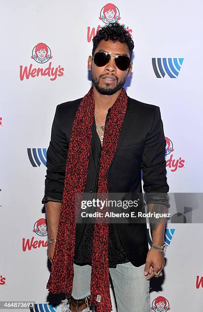 Songwriter Miguel poses backstage at the GRAMMYs Westwood One Radio Remotes during the 56th GRAMMY Awards at the Staples Center Arena Club on January...