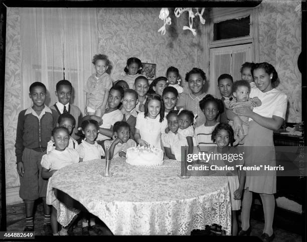 Group portrait of birthday party, including Barbara Jean Roberts, Louise Roberts, Betty Lou Roberts, Terry Edwards, Bobby Edwards, Carol Tarplay,...