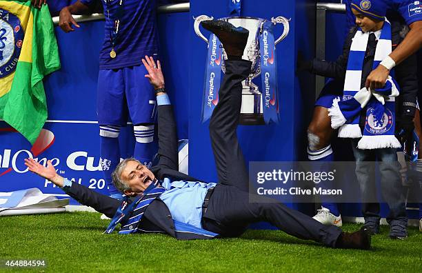 Manager Jose Mourinho of Chelsea on the pitch as Chelsea celebrate with the trophy during the Capital One Cup Final match between Chelsea and...