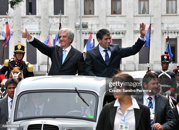 The president of Uruguay, Tabaré Vázquez and vice president Raul Sendic greet the public from the vehicle that takes them from the Parliament toward...