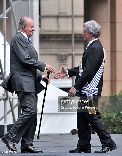 Juan Carlos of Spain presents his compliments to the new president of Uruguay, Tabaré Vázquez, at Independence Square in Montevideo on March 01, 2015...