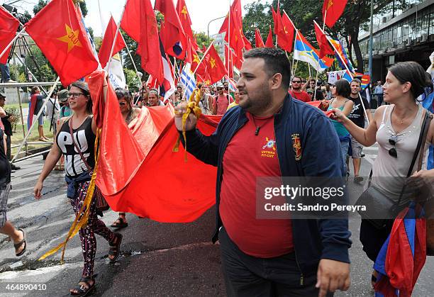 Militants of the Communist Youth Union accompany the new president of Uruguay, Tabaré Vázquez during the transfer from the parliament to the Plaza...