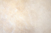 A background wall of abstract rock in beige
