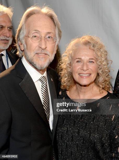 President of the National Academy of Recording Arts and Sciences Neil Portnow and honoree Carole King attend 2014 MusiCares Person Of The Year...