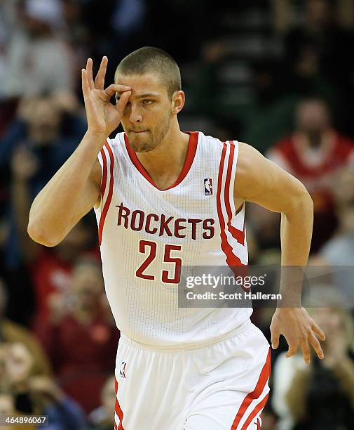 Chandler Parsons of the Houston Rockets celebrates a three-pointer against the Memphis Grizzlies during the game at the Toyota Center on January 24,...