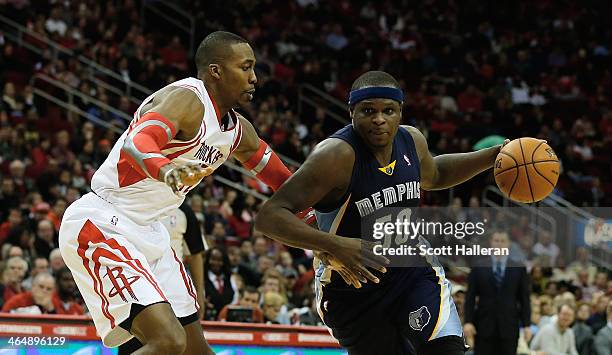 Zach Randolph of the Sacramento Kings drives against Dwight Howard of the Houston Rockets during the game at the Toyota Center on January 22, 2014 in...