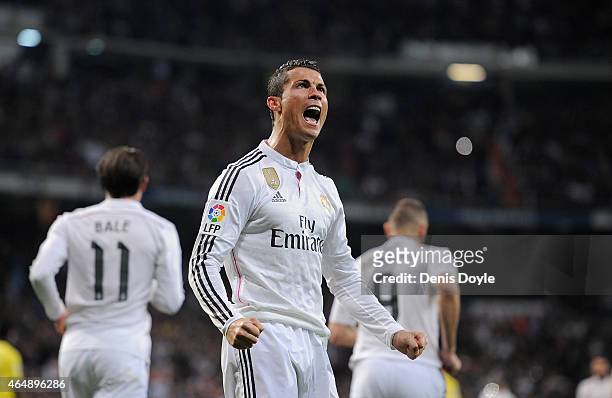 Cristiano Ronaldo of Real Madrid celebrates after scoring his team's opening goal during the La Liga match between Real Madrid and Villarreal at...