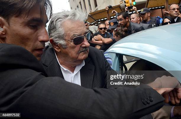 Former Uruguayan president Jose Pepe Mujica leaves the Plaza Independencia, after the inauguration of the new President Tabare Vazquez on March 1,...