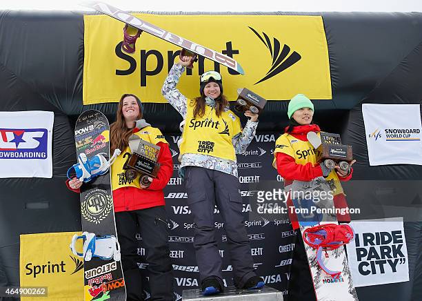 Arielle Gold in second place, Kelly Clark in first place and Xuetong Cai of China in third place celebrate on the podium after winning the FIS...