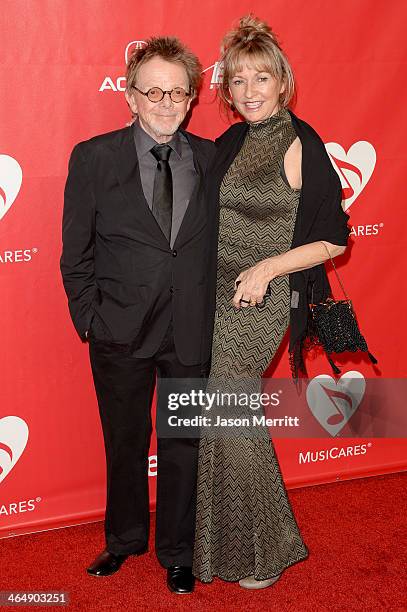 Songwriter Paul Williams and Mariana Williams attend The 2014 MusiCares Person Of The Year Gala Honoring Carole King at Los Angeles Convention Center...