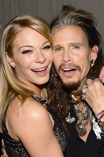 Recording artists LeAnn Rimes and Steven Tyler attend 2014 MusiCares Person Of The Year Honoring Carole King at Los Angeles Convention Center on...
