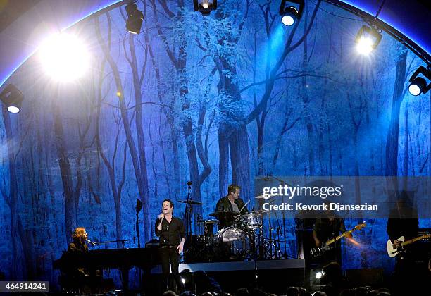 Musicians Jerry Becker, Pat Monahan, Scott Underwood, Hector Maldonado and Jimmy Stafford perform onstage at The 2014 MusiCares Person Of The Year...