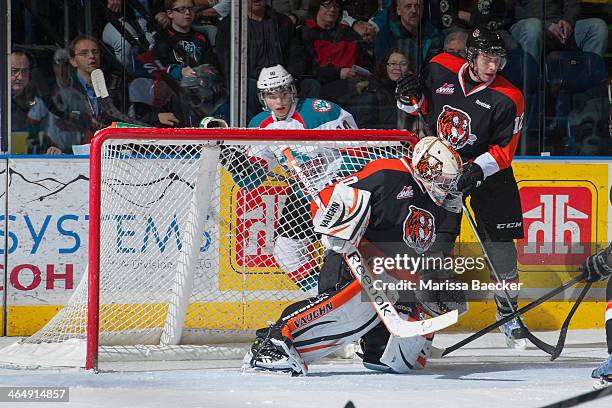 Marek Langhamer of the Medicine Hat Tigers defends the net against the Kelowna Rockets on January 24, 2014 at Prospera Place in Kelowna, British...