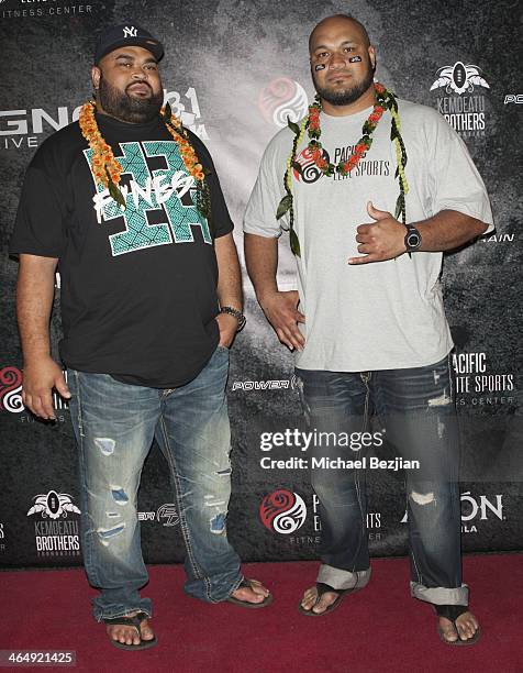 Former NFL players Chris Kemoeatu and Maake Kemoeatu attend the Pacific Elite Sports Fitness Center Grand Opening on January 24, 2014 in Kaneohe,...