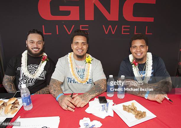 Players Ray Maualuga, Maurkice Pouncey, and Mike Pouncey at the Pacific Elite Sports Fitness Center Grand Opening on January 24, 2014 in Kaneohe,...