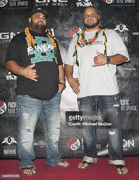 Former NFL players Chris Kemoeatu and Maake Kemoeatu attend the Pacific Elite Sports Fitness Center Grand Opening on January 24, 2014 in Kaneohe,...