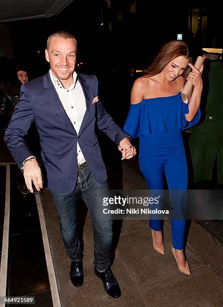 Jamie O'Hara and Danielle Lloyd are seen leaving the Dorchester Hotel, Park Lane on January 26, 2014 in London, England.