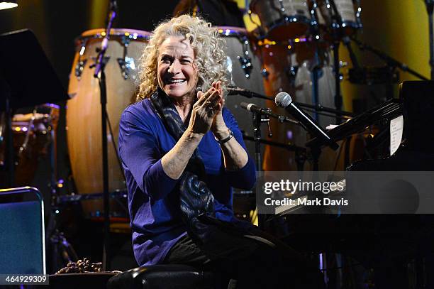 Honoree Carole King performs onstage at 2014 MusiCares Person Of The Year Honoring Carole King at Los Angeles Convention Center on January 24, 2014...