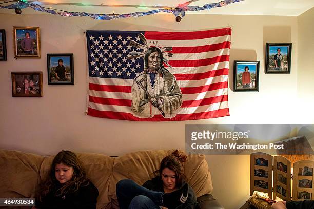 Siblings Dari Hazen and Jatika Hazen socialize and play video games at their home in Watersmeet, MI on December 20, 2014. The family lives on the Lac...
