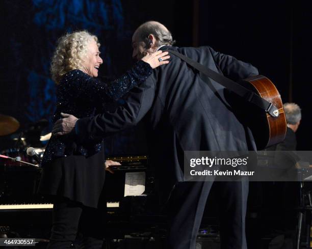 Carole King and James Taylor perform onstage at 2014 MusiCares Person Of The Year Honoring Carole King at Los Angeles Convention Center on January...