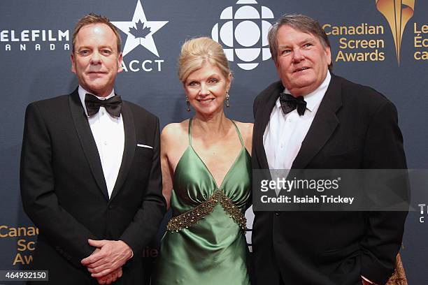 Actor Kiefer Sutherland, Catherine Gourdier and Don Carmody and arrive at the 2015 Canadian Screen Awards at the Four Seasons Centre for the...