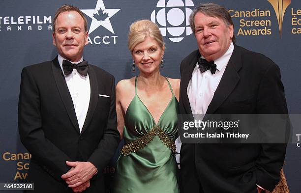 Actor Kiefer Sutherland, Catherine Gourdier and Don Carmody and arrive at the 2015 Canadian Screen Awards at the Four Seasons Centre for the...