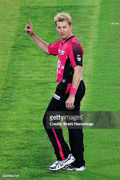 Brett Lee of the Sixers celebrates after taking the wicket of Kurtis Patterson of the Thunder during the Big Bash League match between Sydney Thunder...