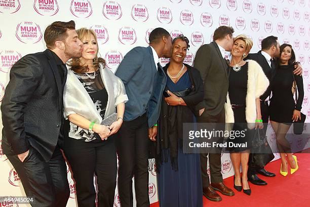 Duncan James, mother, Simon Webbe, mother, Antony Costa, mother, Lee Ryan and mother attend the Tesco Mum of the Year awards at The Savoy Hotel on...
