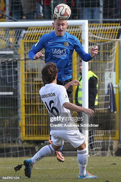 Sebastian ManstrÃ¶m of Elversberg with Alexander Hahn of Saarbruecken during the Regionalliga Suedwest match between SV Elversberg and 1. FC...