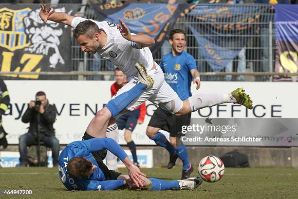 Timo Wenzel of Elversberg with Matthew Taylor of Saarbruecken during the Regionalliga Suedwest match between SV Elversberg and 1. FC Saarbruecken on...