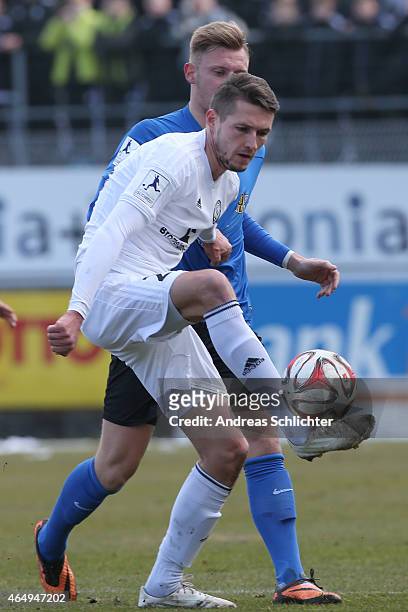 Mijo Tunjic of Elversberg with Alexander Hahn of Saarbruecken during the Regionalliga Suedwest match between SV Elversberg and 1. FC Saarbruecken on...