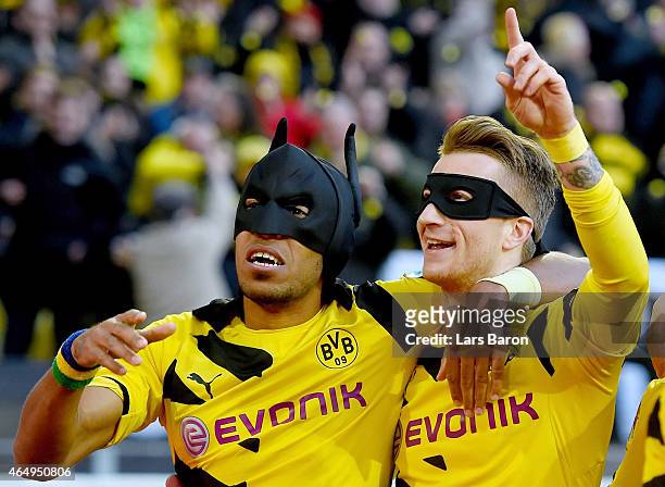 Pierre-Emerick Aubameyang of Borussia Dortmund celebrates with Marco Reus of Borussia Dortmund after scoring his teams first goal during hte...