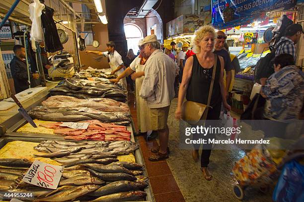 Tourists and locals walk around the Santiago Central Market on February 28th, 2015 in Santiago de Chile, Chile. The Central Market is a traditional...