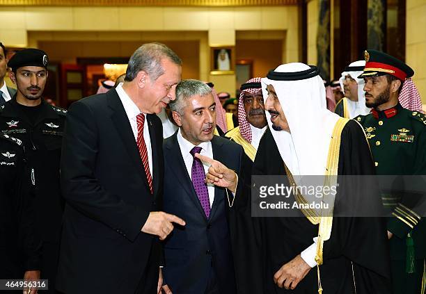 Turkish President Recep Tayyip Erdogan is bid farewell by King of Saudi Arabia, Salman bin Abdulaziz Al Saud after their meeting at Riyadh's Erga...