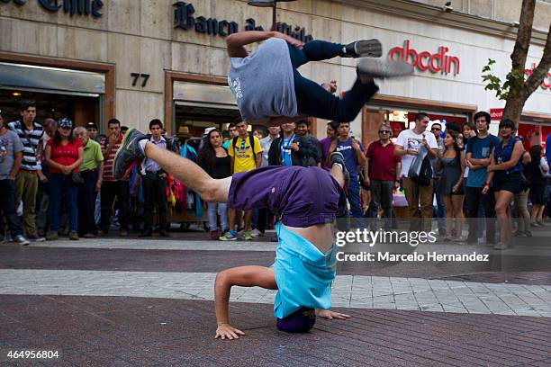 Street artist dance at Santiago downtown on February 23, 2015 in Santiago de Chile, Chile. Santiago will be one of the eight host cities of the next...