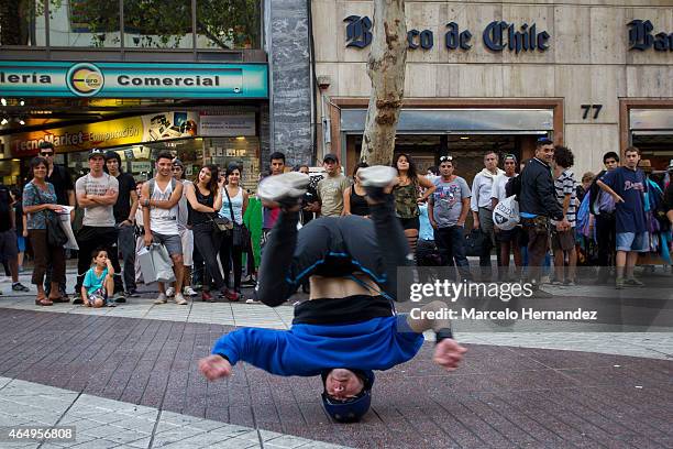 Street artist performs at Santiago downtown on February 23, 2015 in Santiago de Chile, Chile. Santiago will be one of the eight host cities of the...