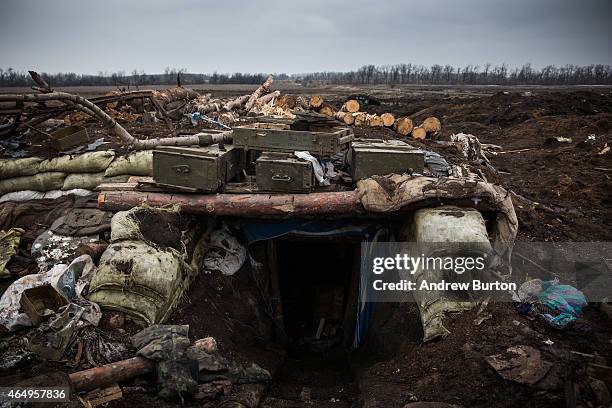 Destroyed military equipment litters an entrenched battlefield where the Ukrainian army was defeated by pro-Russian rebels on March 2, 2015 on the...