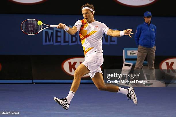 Robert Lindstedt of Sweden plays a forehand in his Men's Doubles Final with Lukasz Kubot of Poland against Eric Butorac of the United States and...